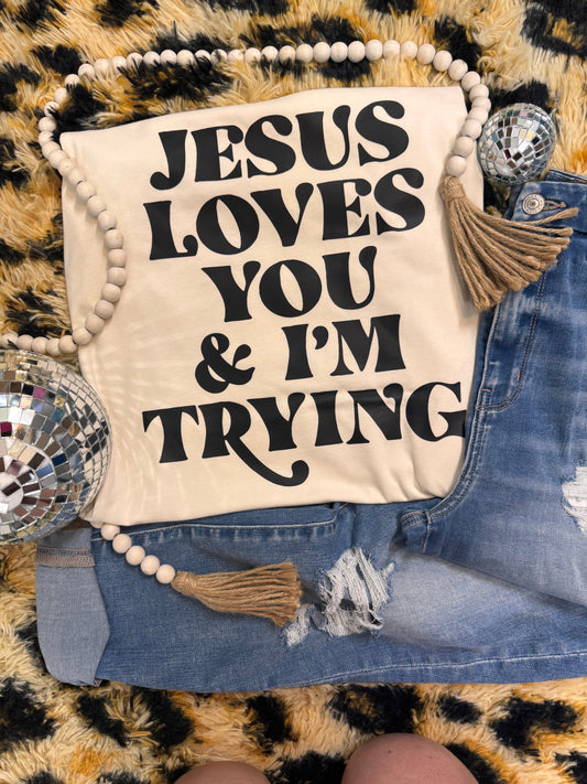 Jesus Loves You and I’m Trying Graphic Tee