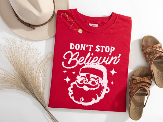 Don't Stop Believin' Santa Graphic Tee