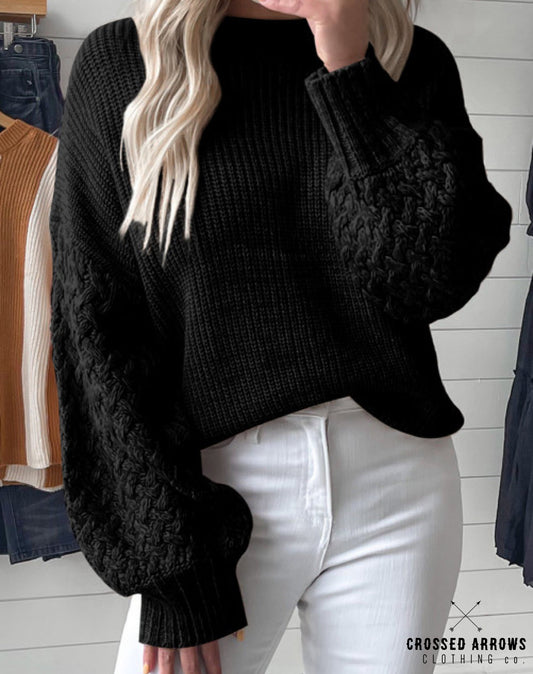 Black cable knit sweater